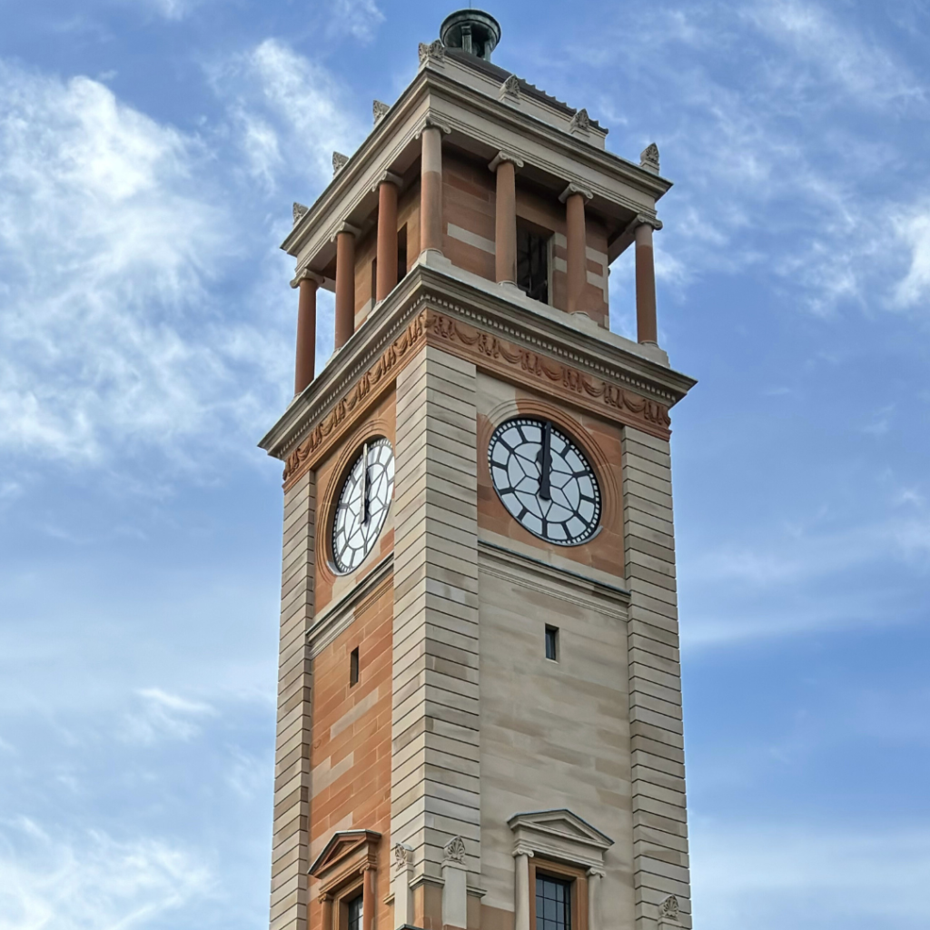 Aboriginal Justice Service Hub held at Newcastle Town Hall, building against blue sky and clouds