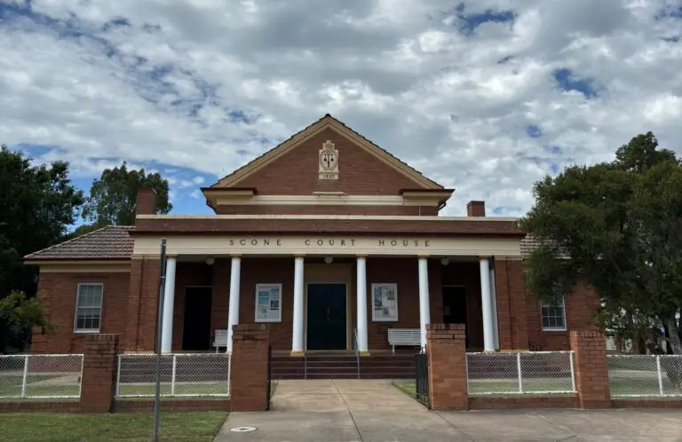 Scone court house brick building with white columns